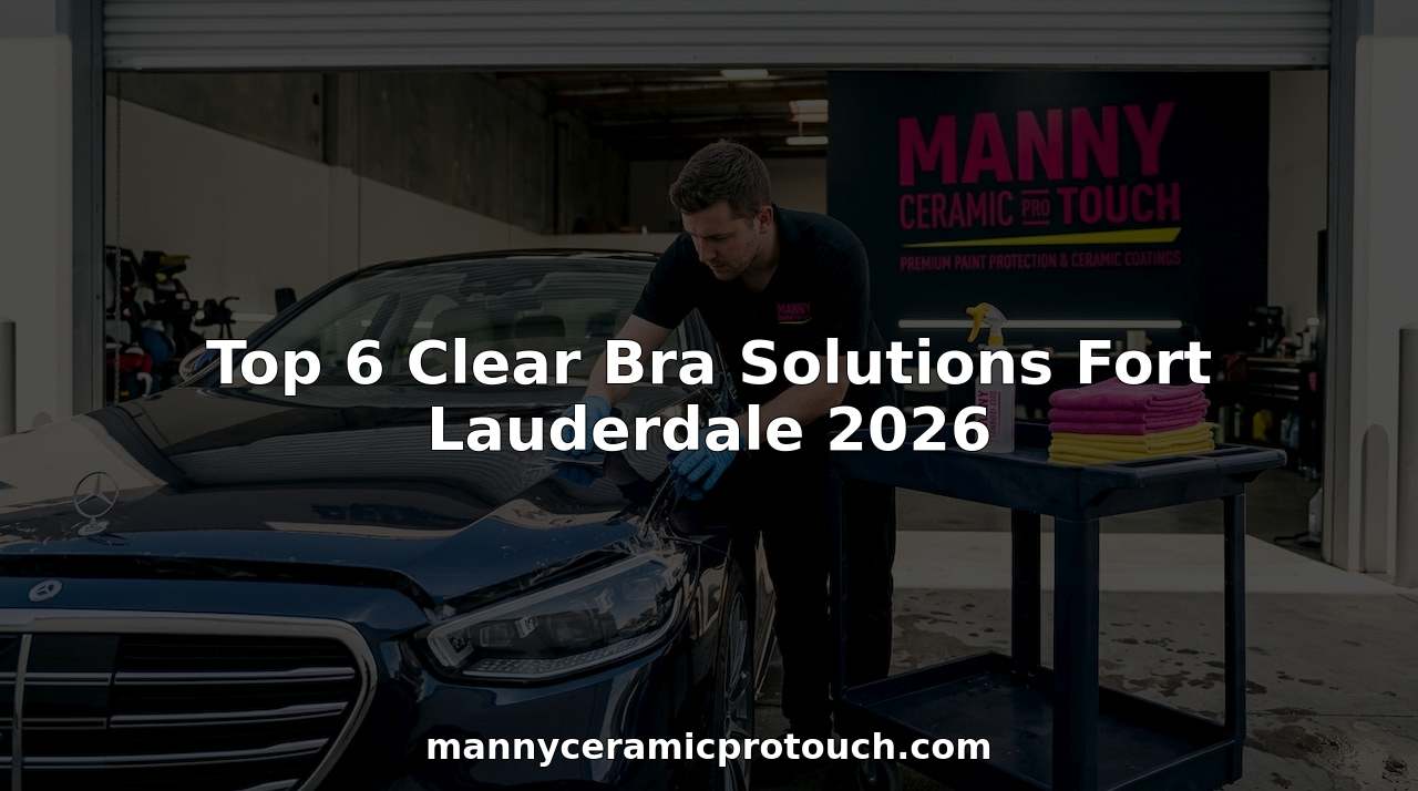 Technician applying clear film on luxury car hood