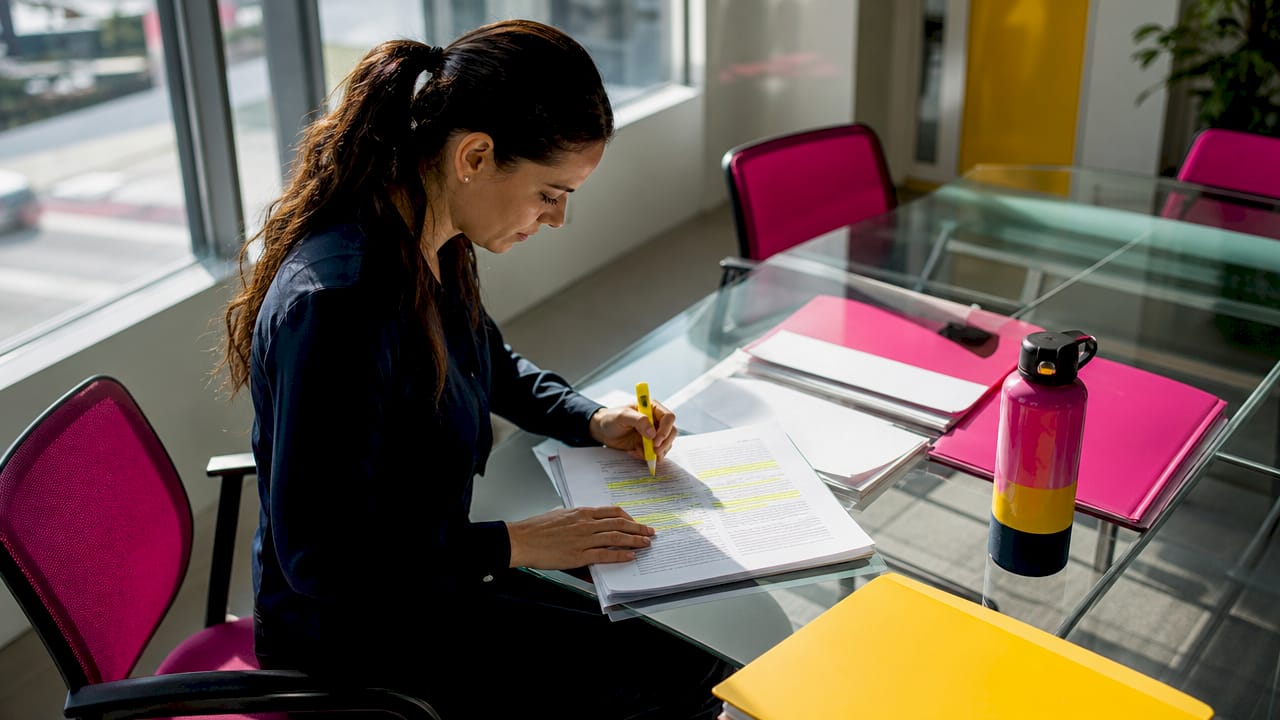 Officer reviewing environmental law documents